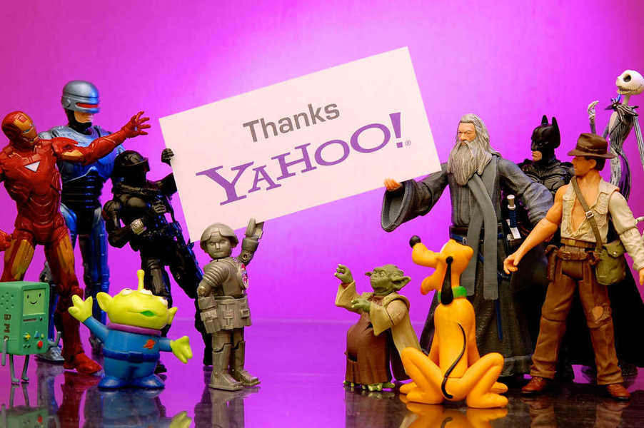 Photo of a group of characters holding up a sign thanking Yahoo!