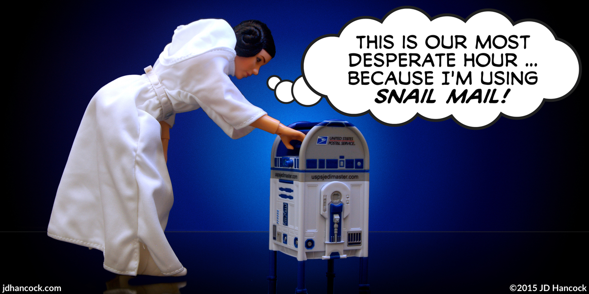 PopFig toy comic with Star Wars' Leia and R2-D2 as a postal box.