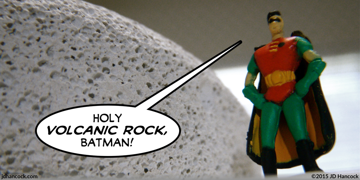 PopFig toy comic with Robin standing next to a pumice stone.