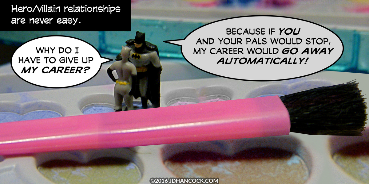 PopFig toy comic with Catwoman and Batman.