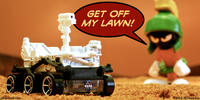 PopFig toy comic with Marvin the Martian and NASA's Mars Curiosity rover.